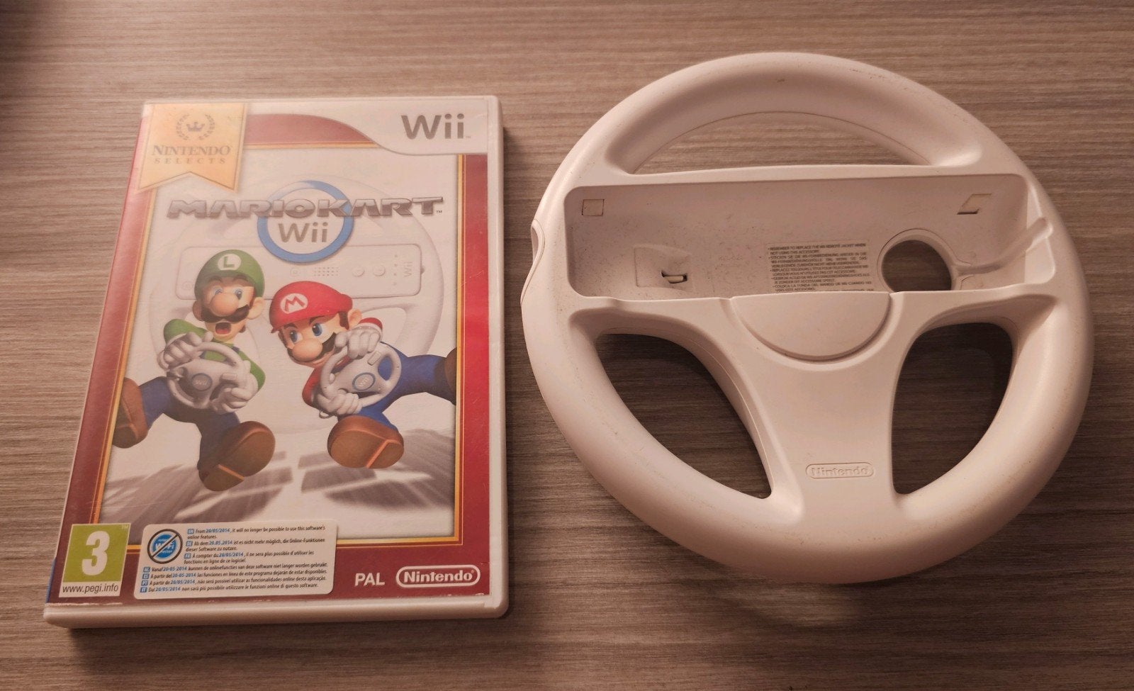 Mario Kart Wii met stuur - Compleet en klaar om te racen!, Spelcomputers en Games, Games | Nintendo Wii, Racen en Vliegen, Eén computer
