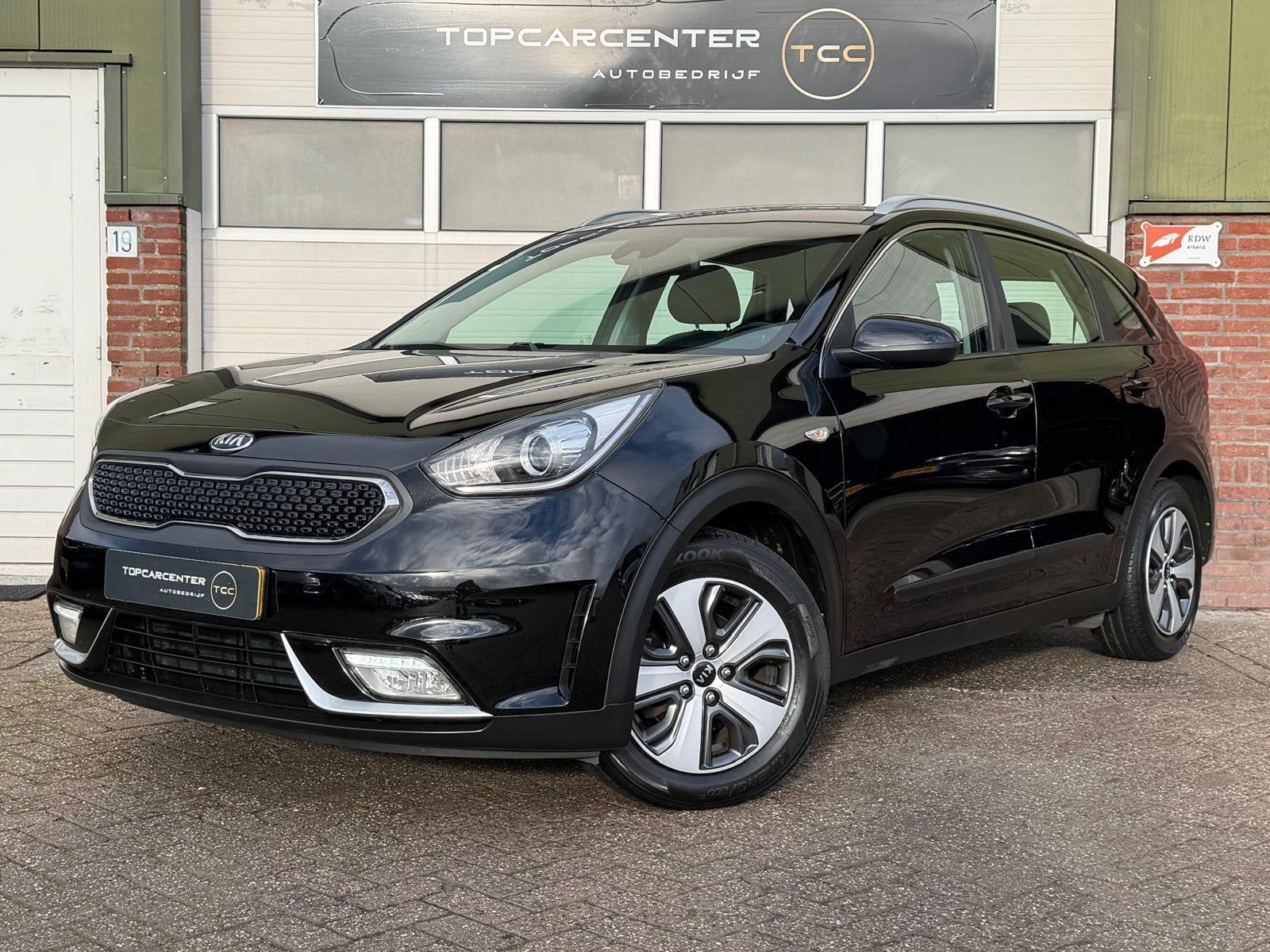 Kia Niro 1.6 GDi Hybrid ComfortLine/AIRCO/AUT/TREKH/APK/NAP, Auto's, Euro 6, Zwart, Origineel Nederlands, 26 km/l