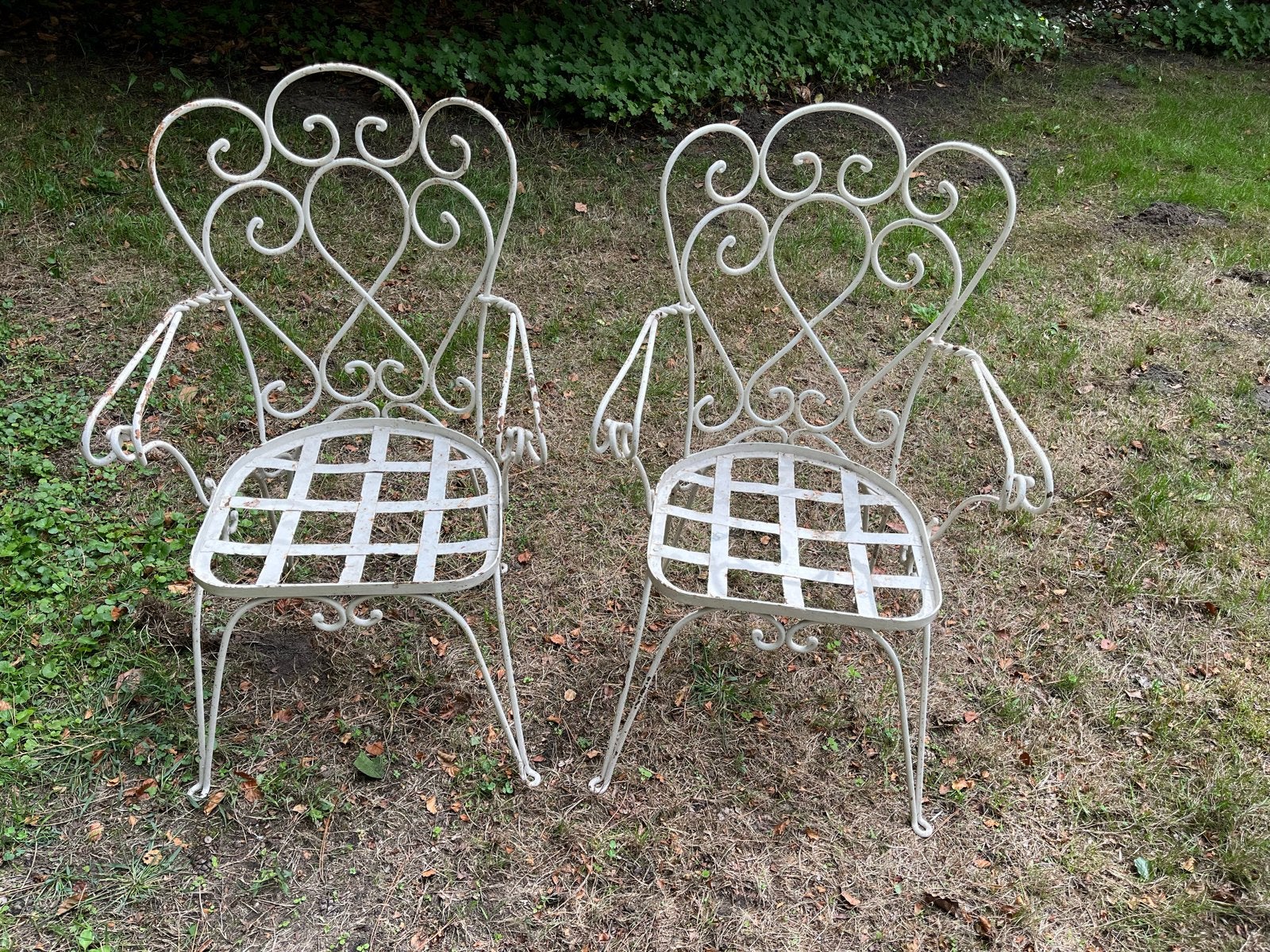 Set van 2 vintage smeedijzeren tuinstoelen inc blauwe kussen, Tuin en Terras, Ophalen of Verzenden, Gebruikt, Metaal