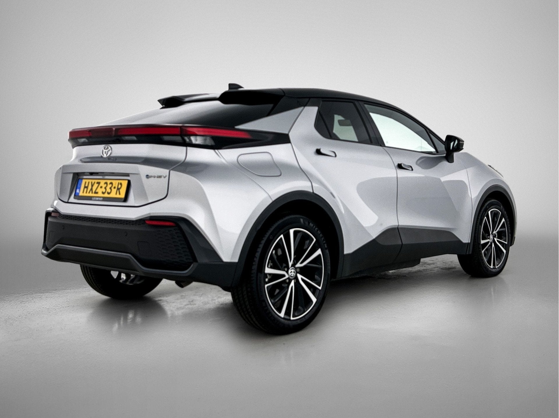 Toyota C-HR 2.0 Plug-in Hybrid 220 Executive | BTW voertuig, Auto's, Toyota, 4 cilinders, Leder en Stof, Automatische klimaatregeling