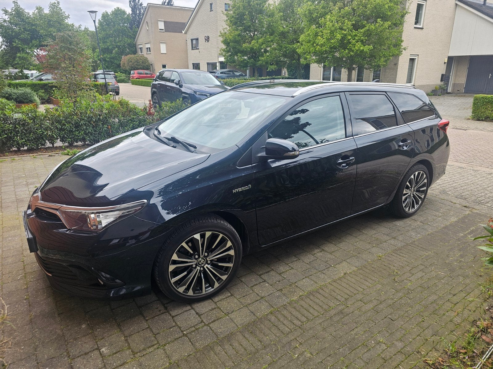 Toyota Auris 1.8 Hybrid Touring Sports CVT 2015 Grijs, Auto's, Toyota, Zwart, 345 kg, Blauw, Origineel Nederlands