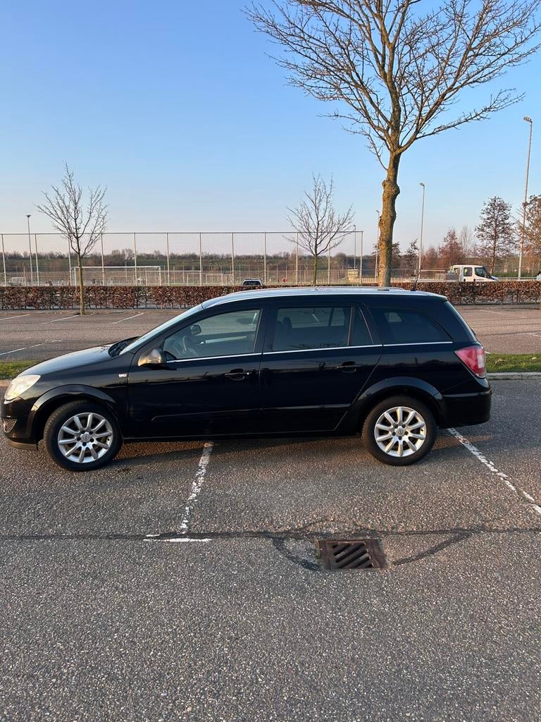 Opel Astra 1.6 16V 85KW St.wgn. 2007 Zwart, Auto's, Opel, Voorwielaandrijving, 657 kg, 15 km/l, 4 cilinders