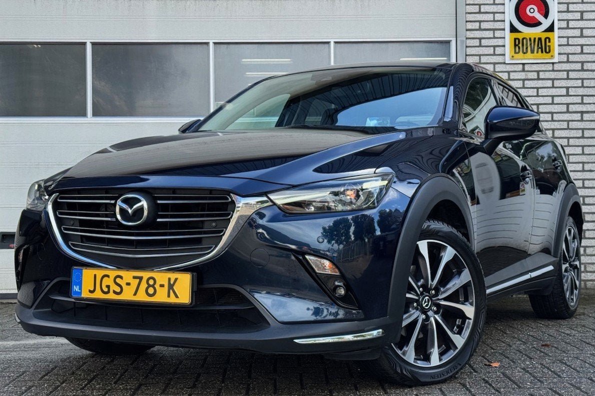 Mazda CX-3 2.0 SkyActiv-G 121 Luxury GT AUT Trekhaak Cruise, Auto's, Gebruikt, 4 cilinders, Blauw, Leder en Stof