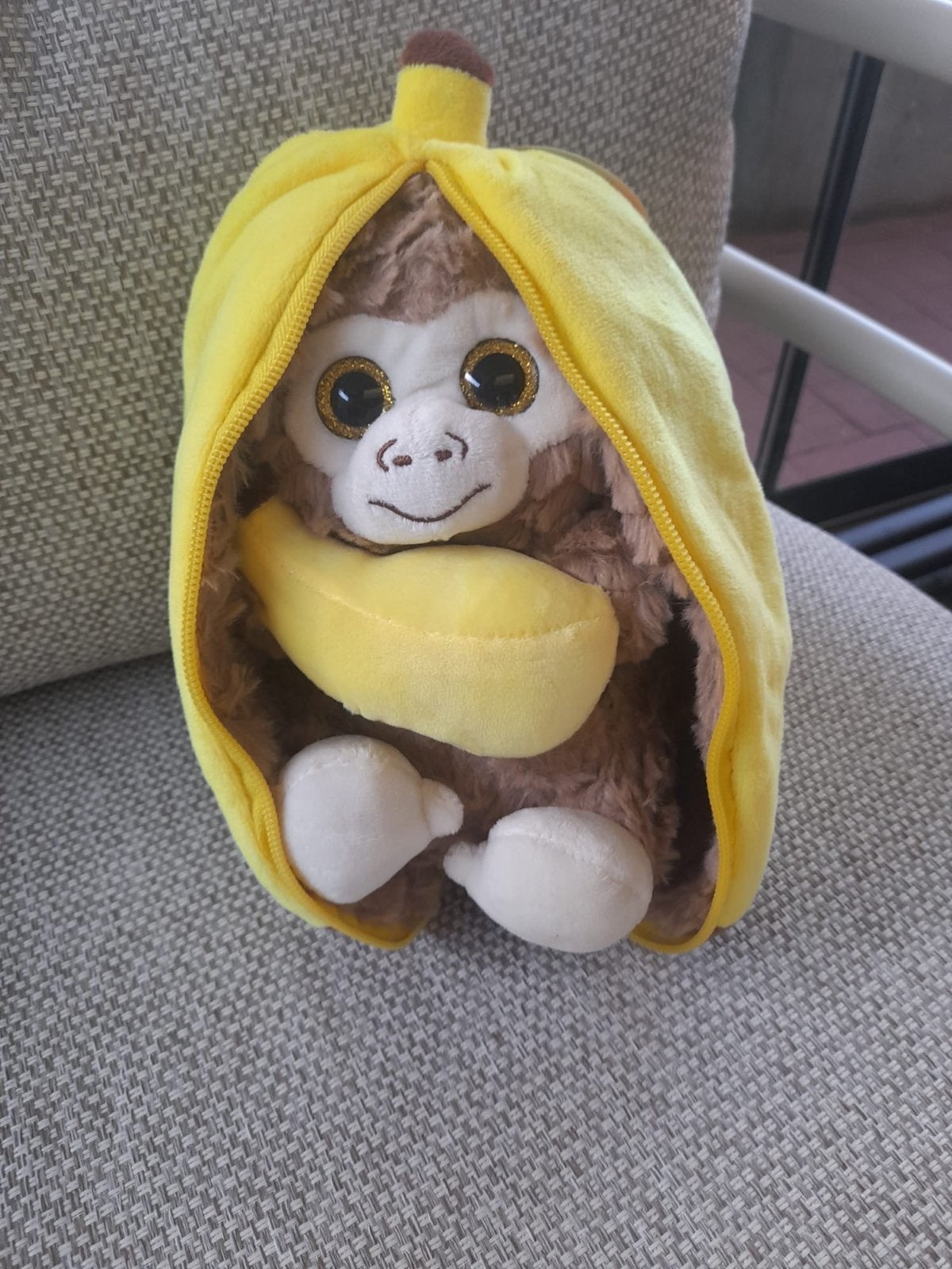 Schatig zacht aapje in een banaan 23cm, Ophalen of Verzenden