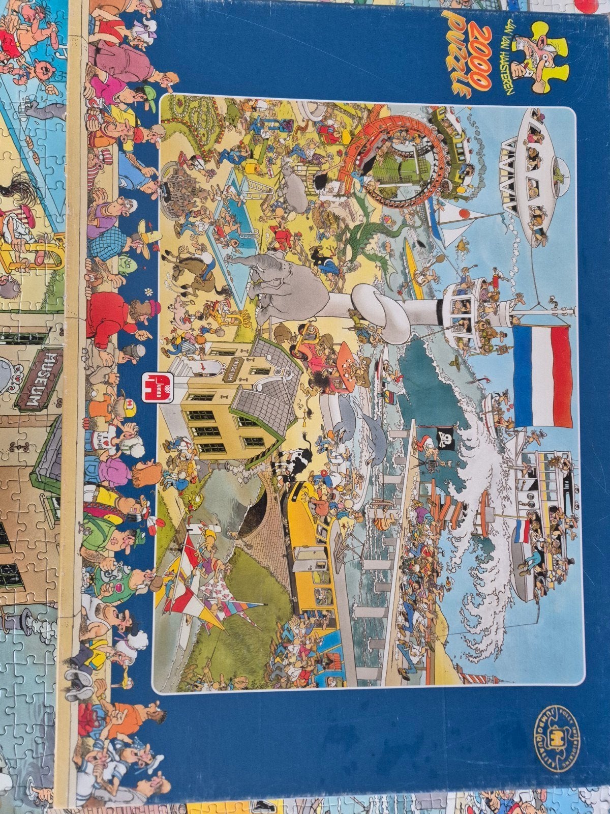 Jan van Haasteren 2000 st.Ter land, ter zee, in de lucht, Ophalen, Meer dan 1500 stukjes, Zo goed als nieuw, Legpuzzel