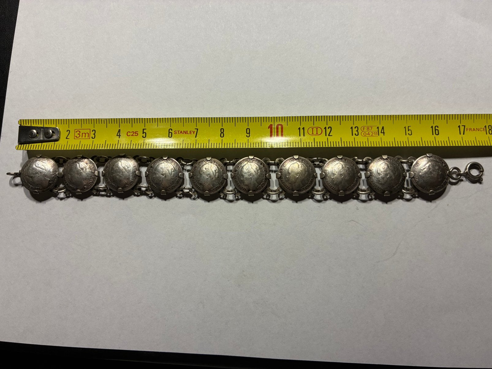Armband van zilveren dubbeltjes., Verzenden, Zo goed als nieuw, Zilver