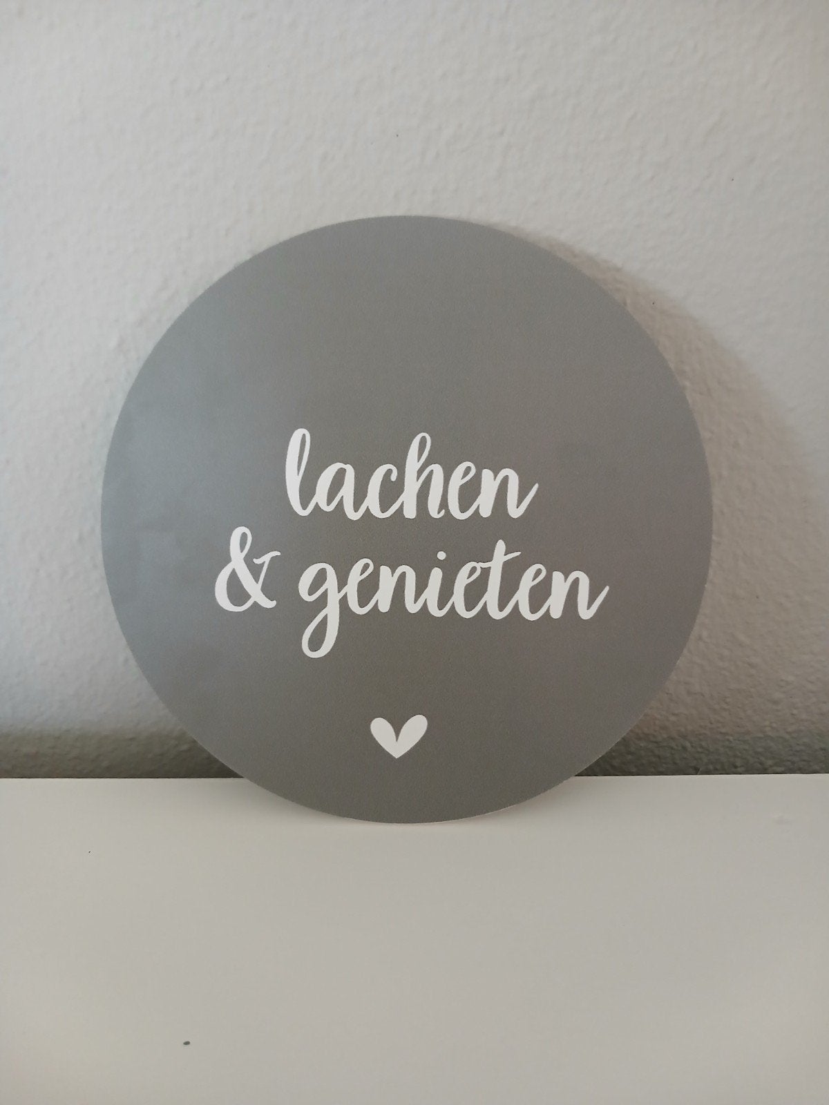Muurcirkel 'lachen en genieten'., Huis en Inrichting, Woonaccessoires | Wanddecoraties, Ophalen of Verzenden