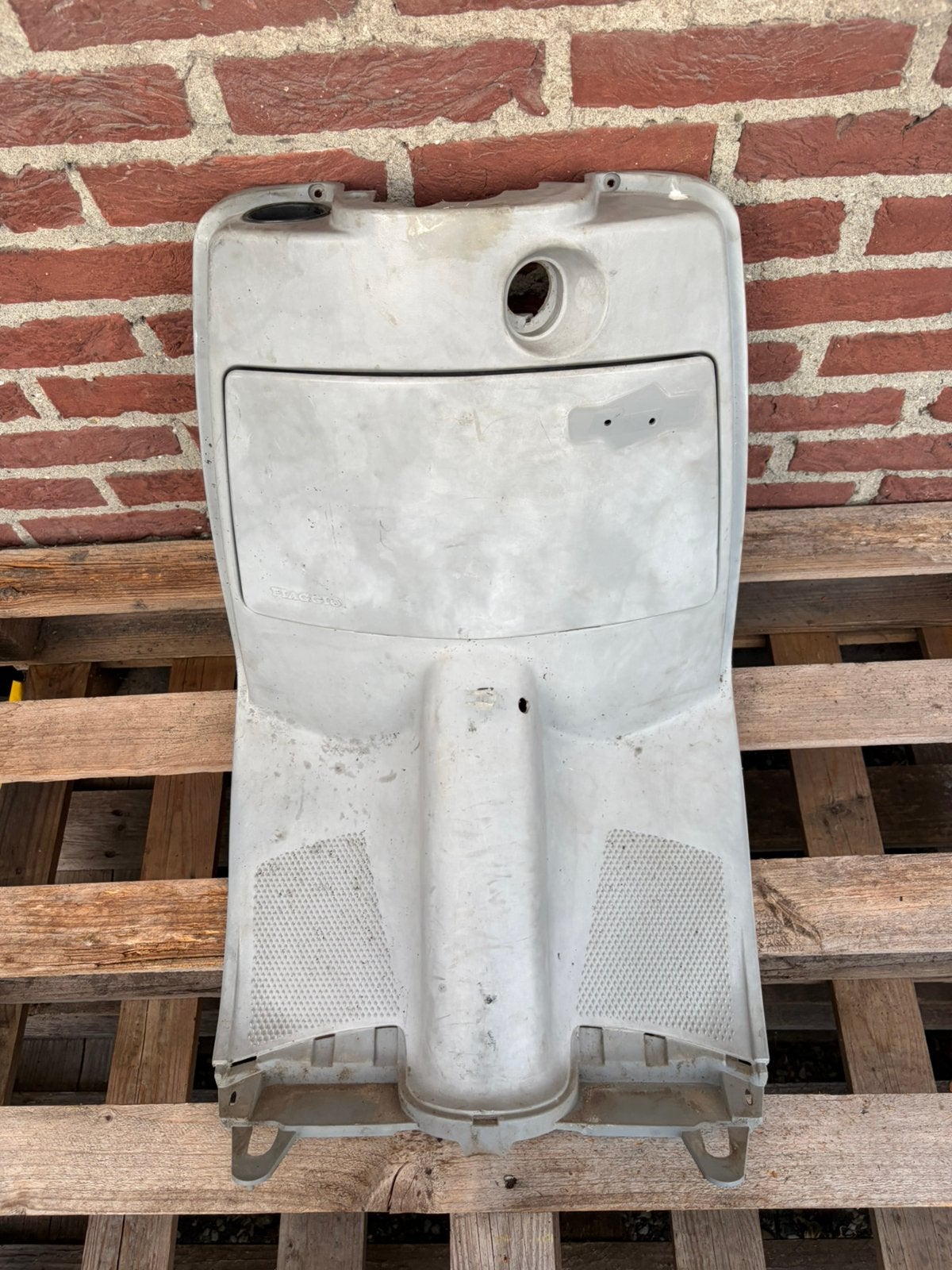 piaggio quartz beenschild, Ophalen