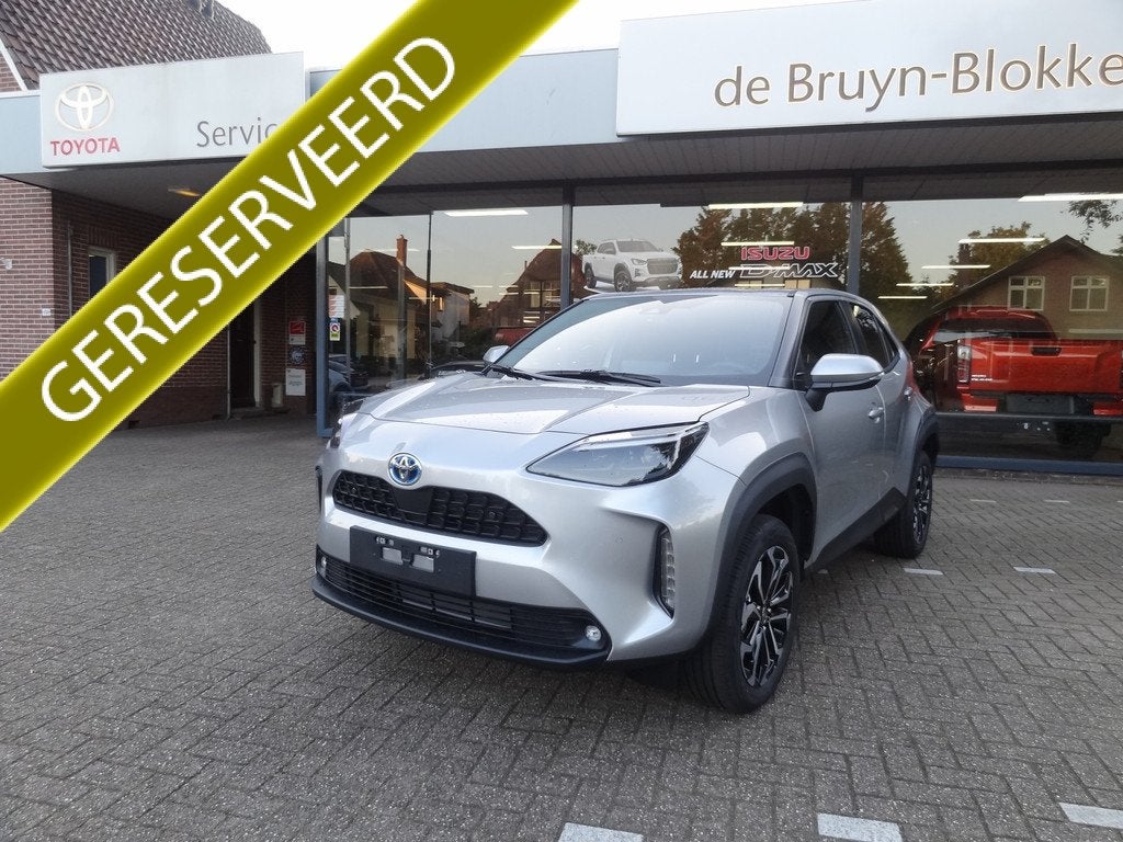 Toyota Yaris Cross 1.5 Hybrid 130pk Dynamic + Comfort Pack d, Stof, Gebruikt, 24 maanden, 1490 cc