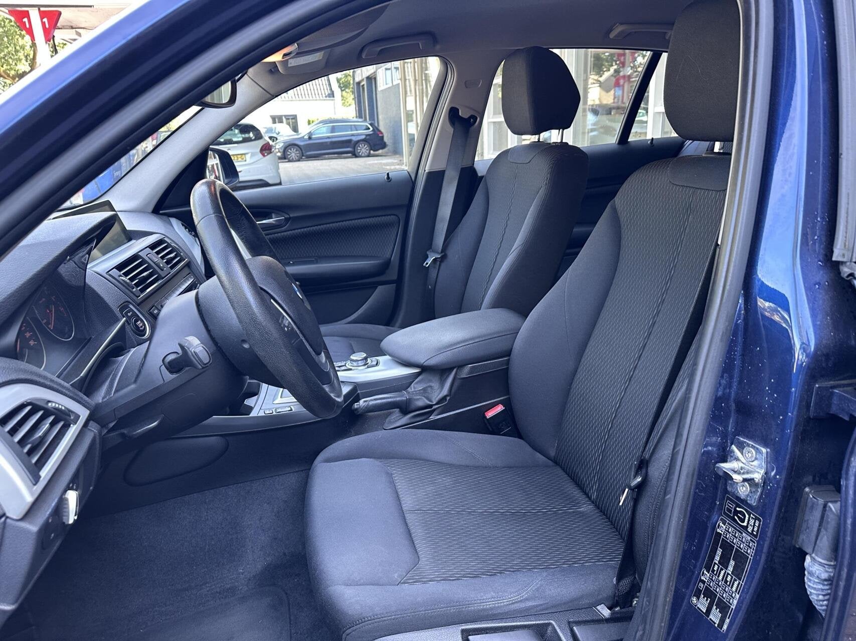 BMW 1-serie 116i Business Urban Xenon/Led, Navi, Bluetooth,, Euro 5, Gebruikt, Met garantie (alle), Blauw