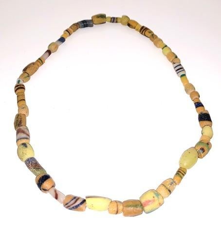 Romeinse glazen kralenketting, 2e-3e eeuw n.Chr. geel/oranje, Antiek en Kunst, Ophalen of Verzenden