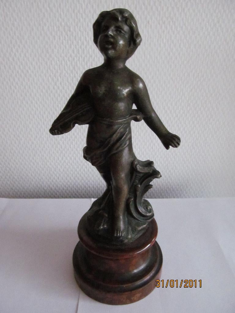 "bronzen" gegoten spelter Franse viooljongen., Ophalen