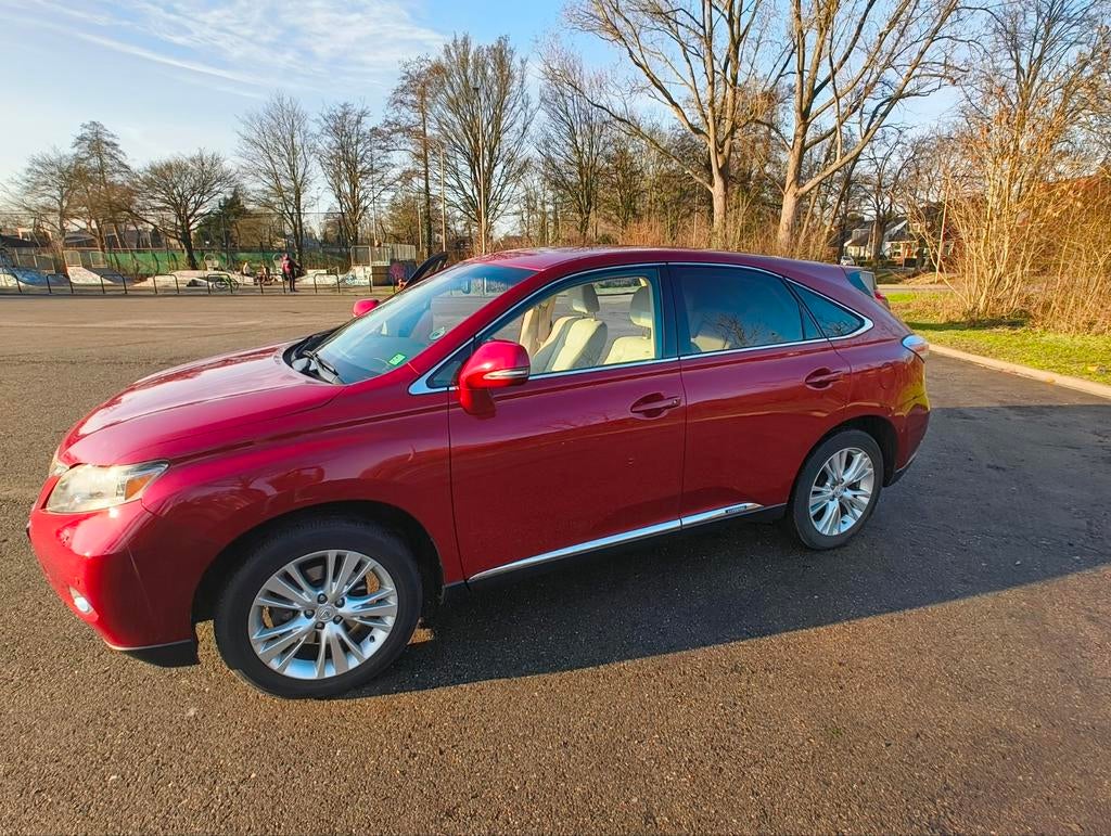 Lexus RX(-H) 450H 3.5 V6 Hybrid 4WD CVT 2010 Rood YOUNGTIMER, Auto's, Lexus, Automaat, 249 pk, Beige, 2000 kg