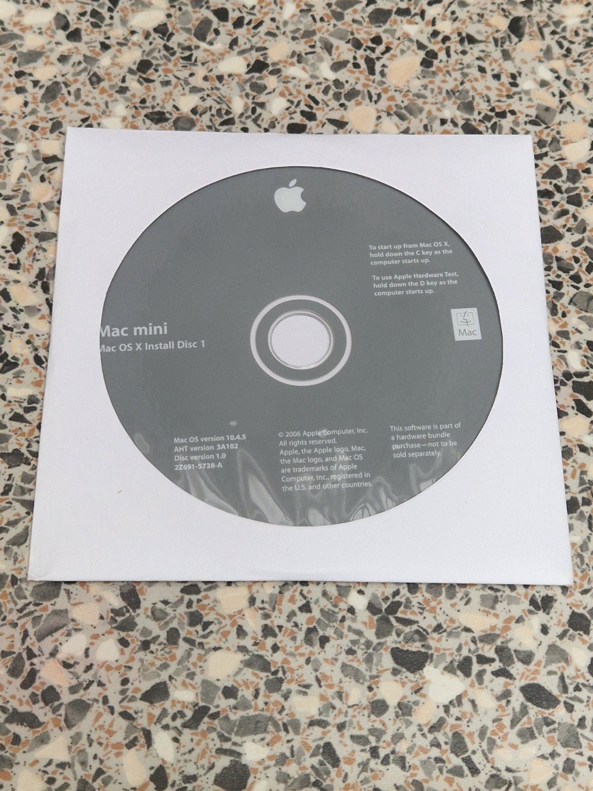 Mac OS X Tiger 10.4.5 installatie disks, Ophalen of Verzenden, Zo goed als nieuw, MacOS