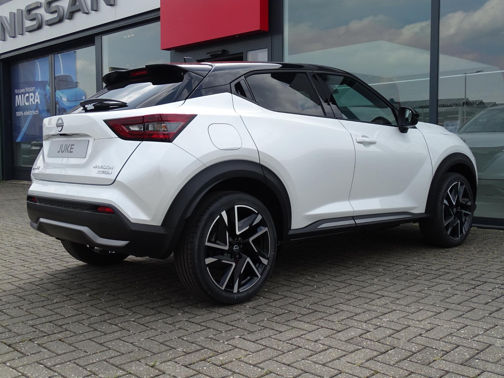 Nissan Juke 1.6 Hybrid N-Design 10 jr garantie! | COLD PACK, Auto's, Stof, Met garantie (alle), Wit, Bedrijf