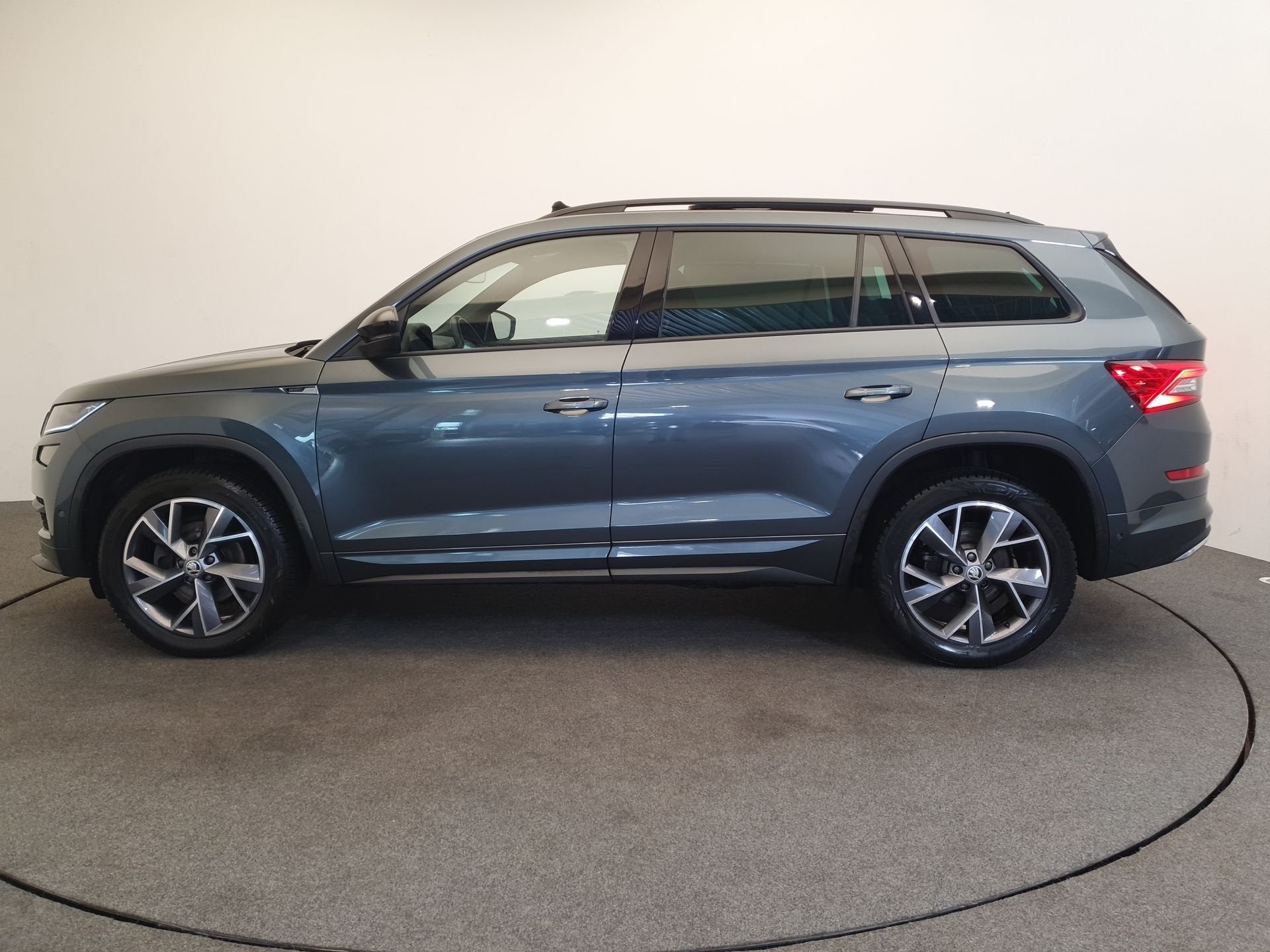 Skoda Kodiaq 1.5 TSI 150pk DSG/AUT Sportline 7p. Wegklapbare, Auto's, 4 cilinders, Bedrijf, 1524 kg, Automatische klimaatregeling