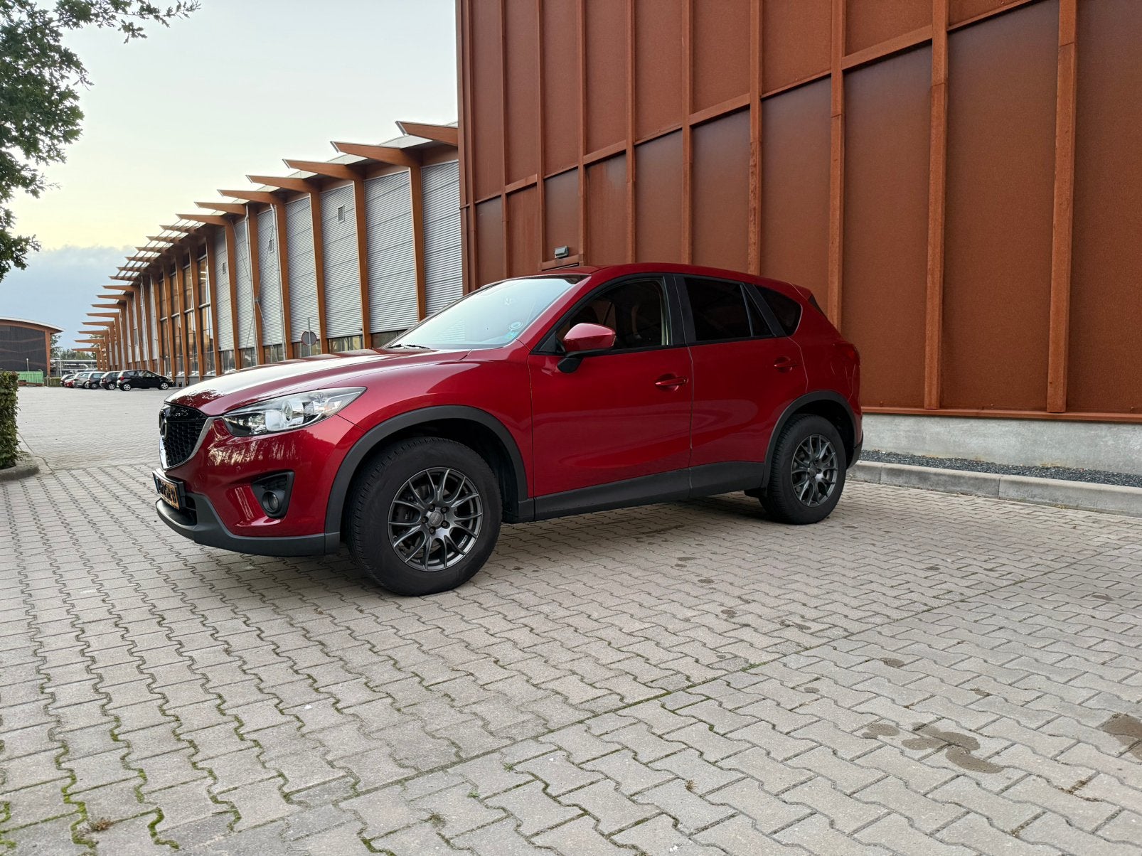 Mazda CX-5 2.0 121KW 2WD 2012 Rood - volledig onderhoud, Auto's, Voorwielaandrijving, Stof, 1800 kg, Zwart