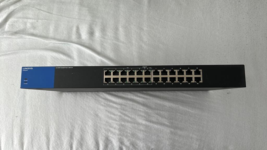 Linksys LGS124P 24-poorts Gigabit PoE+ Switch, Computers en Software, Netwerk switches, Ophalen of Verzenden, Zo goed als nieuw