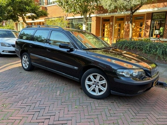 Volvo V70 AWD Summum aut. 2004 Zwart, Auto's, Automaat, 1800 kg, Beige, Stationwagon