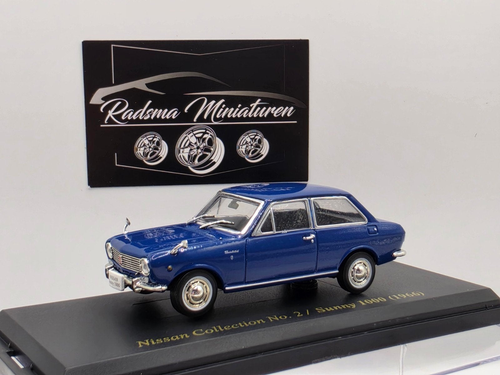 Nissan sunny 1000 - 1966 Blauw - 1:43 Norev Japan collection, Hobby en Vrije tijd, Auto, Norev, Ophalen of Verzenden, Zo goed als nieuw
