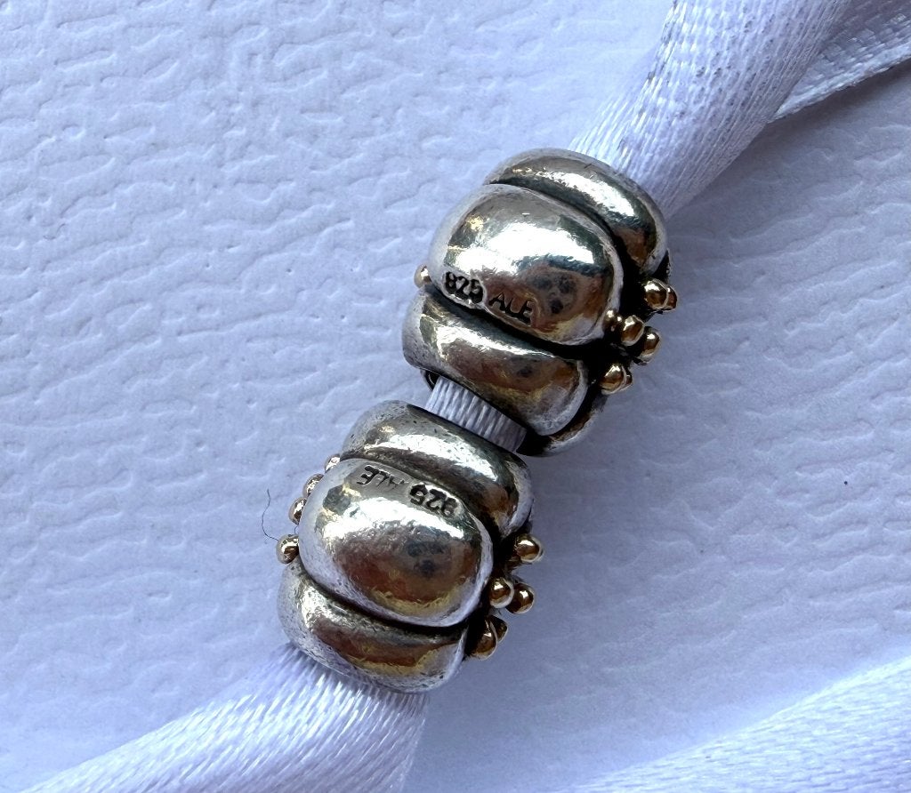2 Pandora Bloembedels goud met zilver, Sieraden, Tassen en Uiterlijk, Pandora, Ophalen of Verzenden, Zo goed als nieuw, 2 of 3 bedels