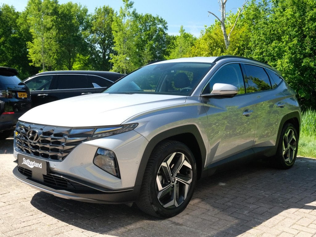 Hyundai Tucson 1.6 T-GDI PHEV Premium 4WD 265 PK | Lederen B, Auto's, Hyundai, Automaat, 14 kWh, Gebruikt, Euro 6