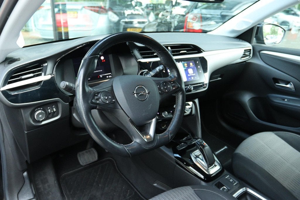 OPEL CORSA-E EDITION 136PK 50 KWH | CARPLAY | VIRT. COCKPIT, 330 km, Gebruikt, Zwart, Geïmporteerd