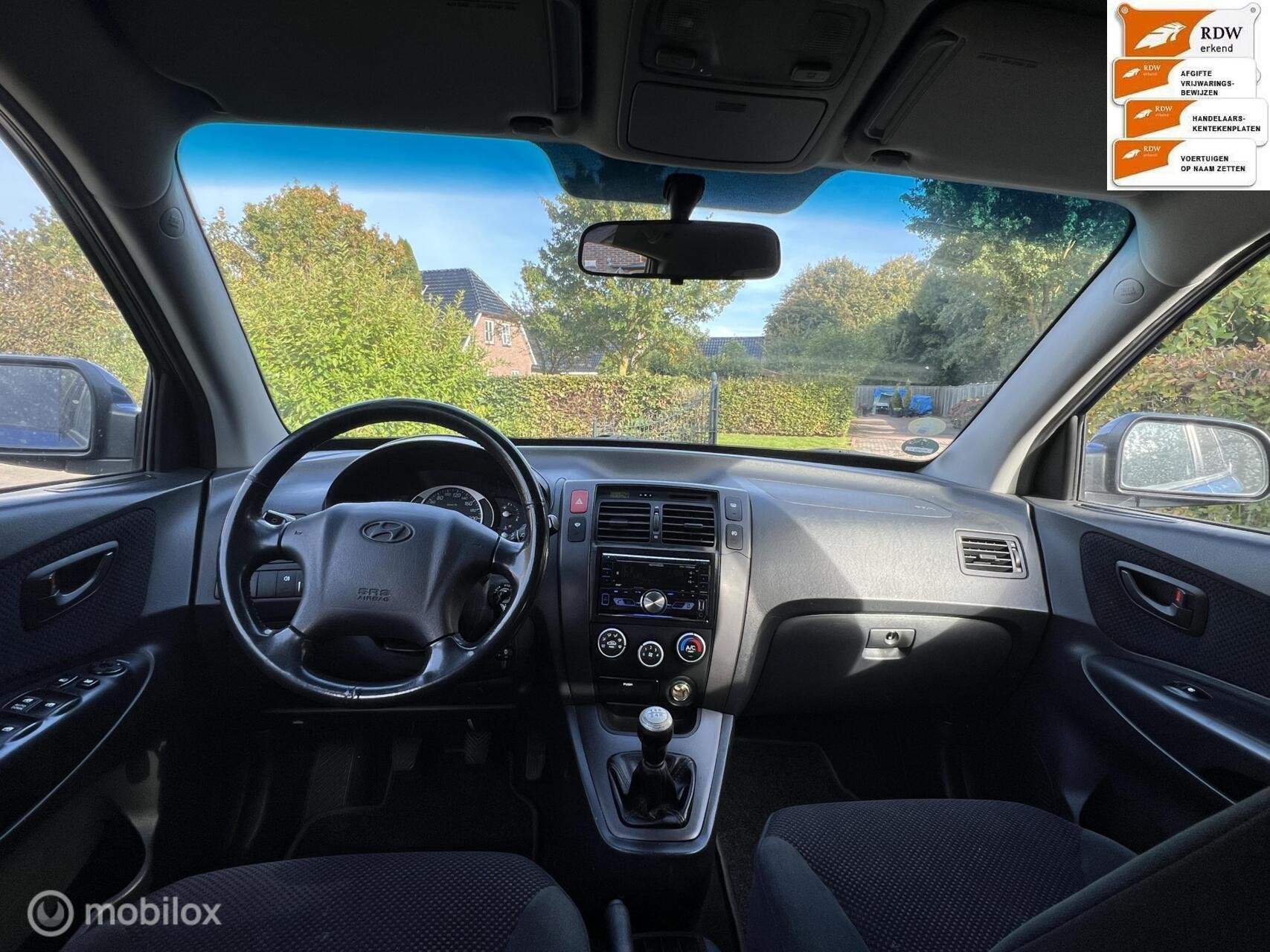 Nette Hyundai Tucson 2.0i Active bj 2007 nwe d-riem, Auto's, Verwarmde buitenspiegels, Gebruikt, 4 cilinders, Blauw