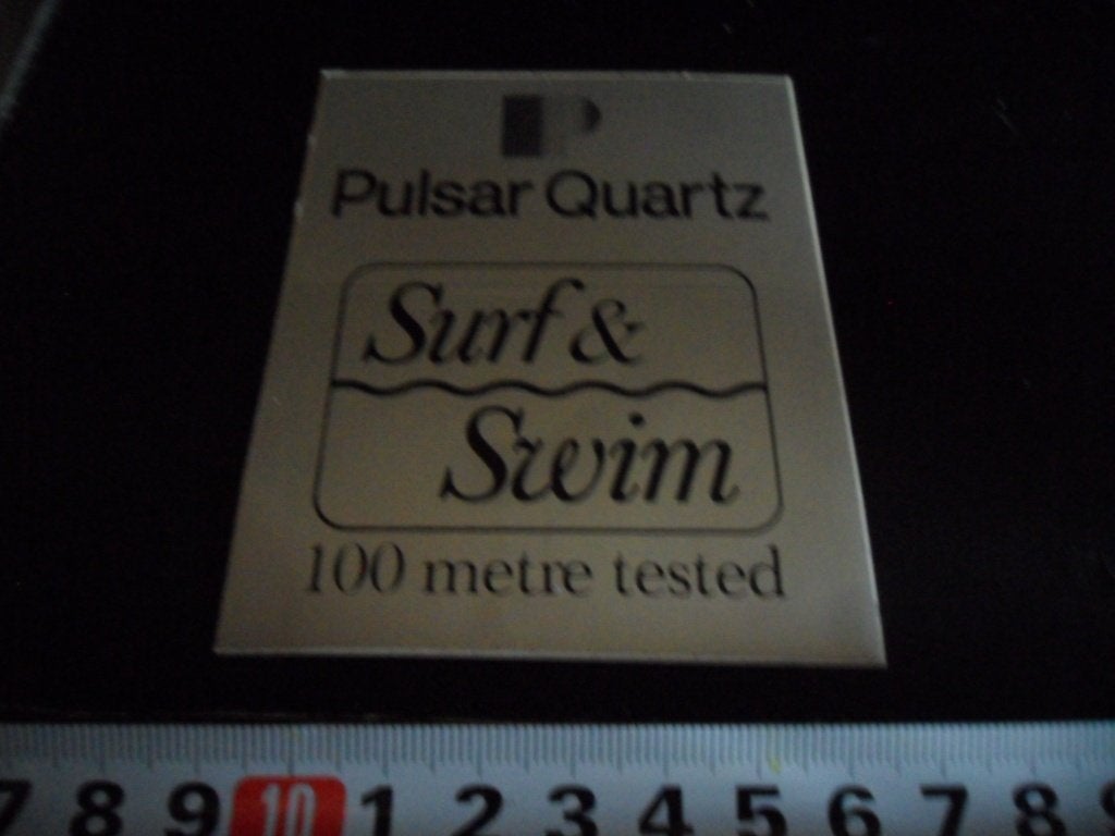 sticker Pulsar Quartz  SURF & SWIM 100 metre tesyed, Ophalen, Zo goed als nieuw