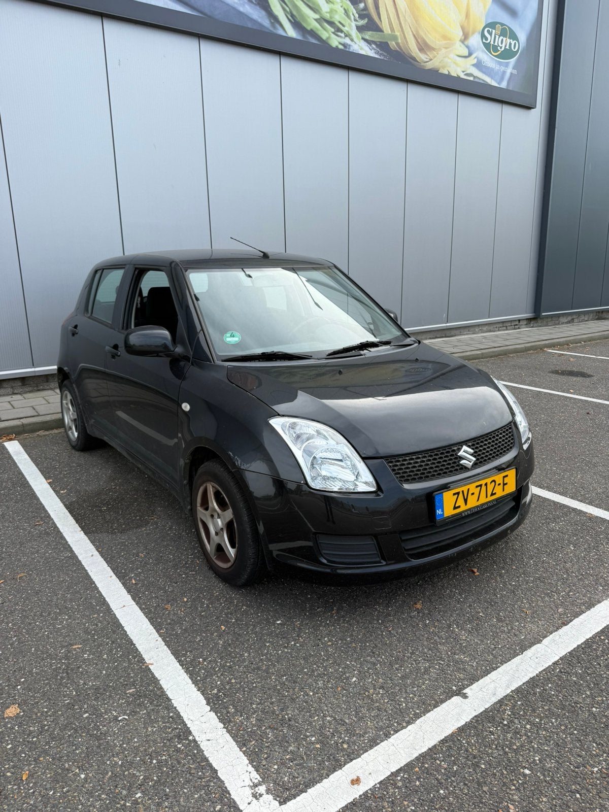 Suzuki Swift 1.3 5D 2009 Zwart, Auto's, Voorwielaandrijving, 40 €/maand, 400 kg, Bedrijf