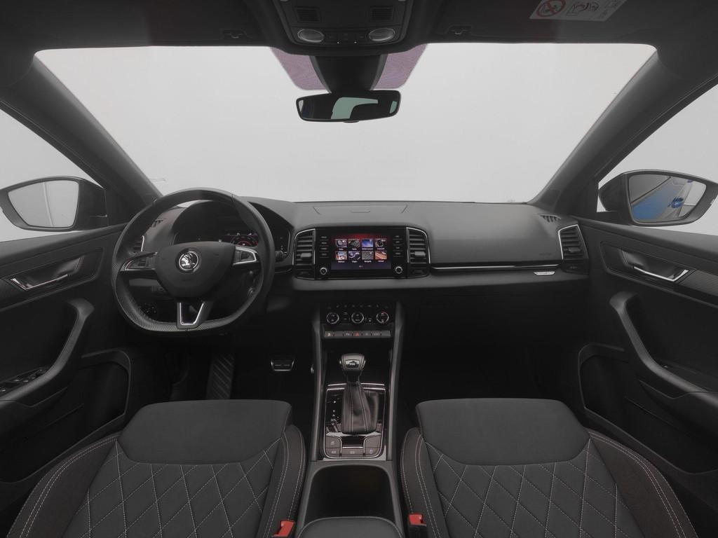 Skoda Karoq 1.5 TSI 150pk AUTOMAAT Sportline Business | Trek, Auto's, Stof, 4 cilinders, Blauw, Bedrijf