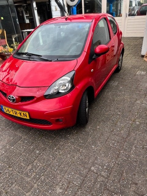 Toyota Aygo 1.0 12V Vvt-i 3DRS MMT 2007 Rood, Voorwielaandrijving, Stof, 4 stoelen, 68 pk
