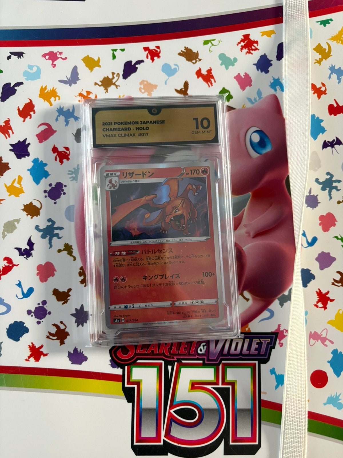Charizard grade 10, Ophalen of Verzenden, Zo goed als nieuw, Meerdere kaarten, Foil