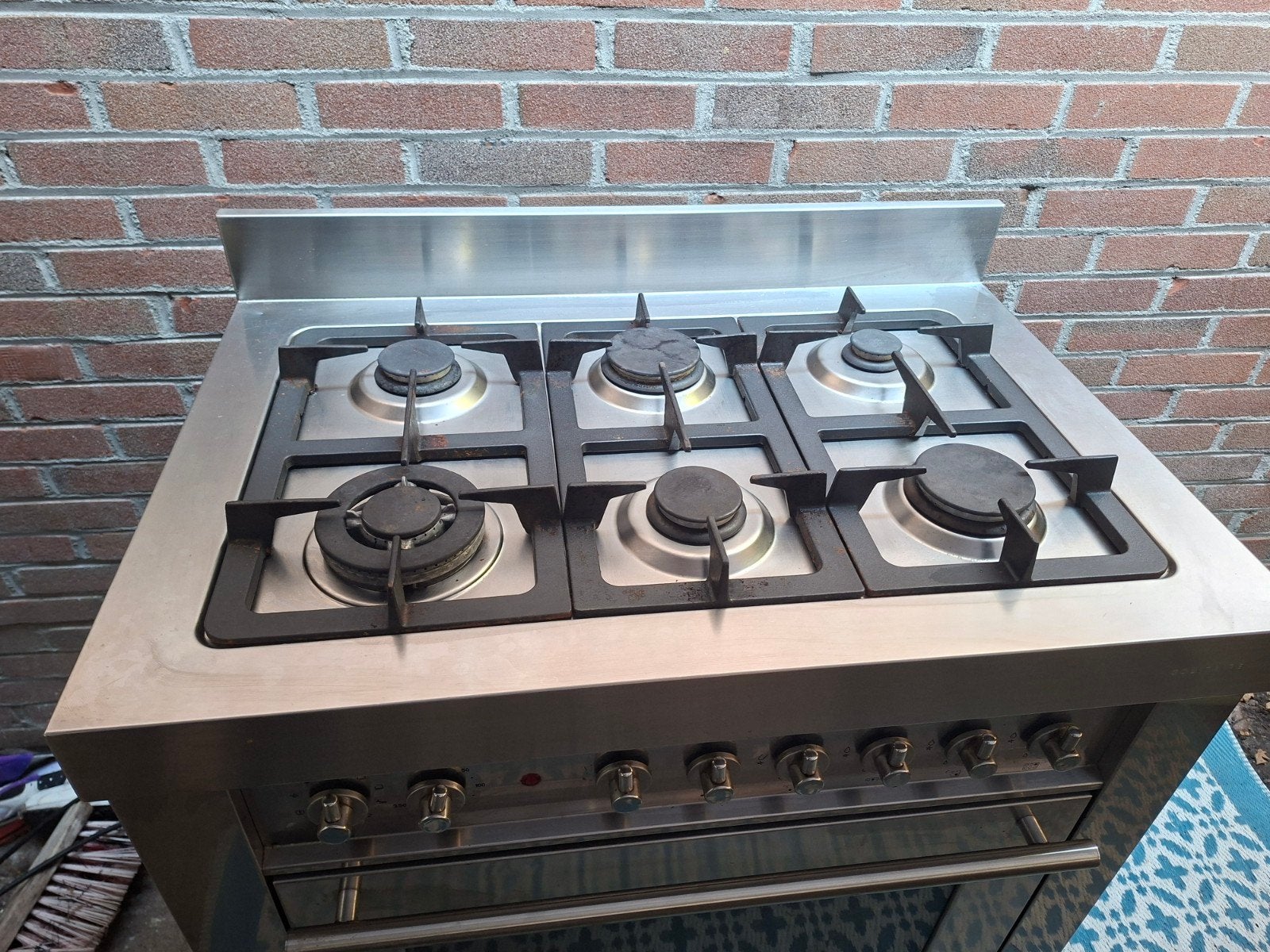 6 pits rvs gasfornuis met oven van solitaire., Ophalen, Gebruikt, 60 cm of meer, Gas