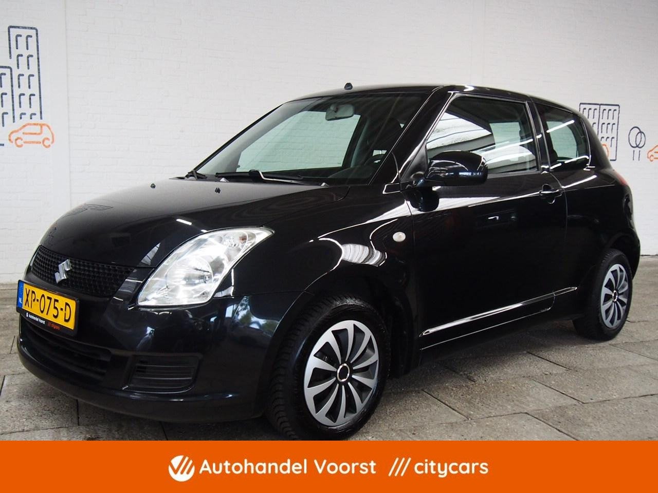 Suzuki Swift 1.3 Base Airco (APK:Nieuw) Incl.Garantie, Auto's, Stof, Gebruikt, Met garantie (alle), Startonderbreker