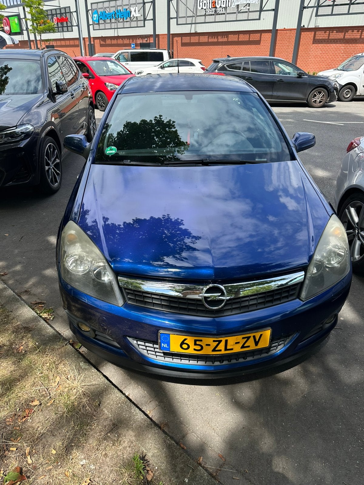 Opel Astra 1.8 16V GTC 2008 Blauw, Auto's, Voorwielaandrijving, 4 cilinders, 1165 kg, Blauw