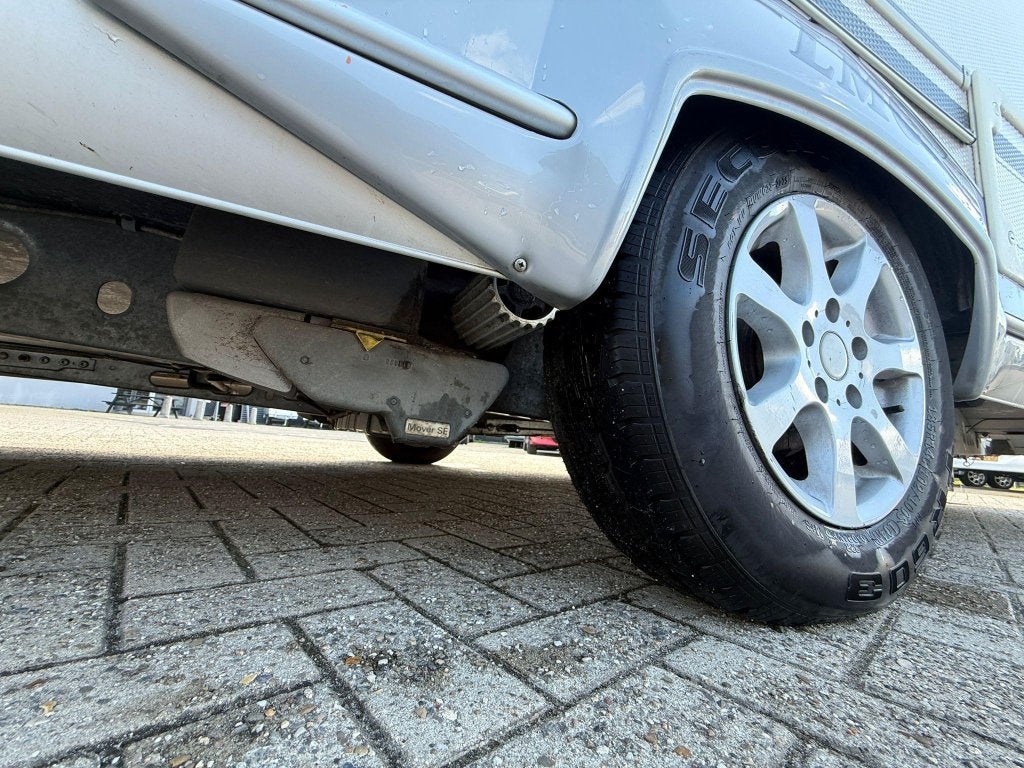 LMC Dominant 550 E Enkele bedden, Mover Trum, Caravans en Kamperen, Caravans, Rondzit, Bedrijf, Kachel, 5 tot 6 meter