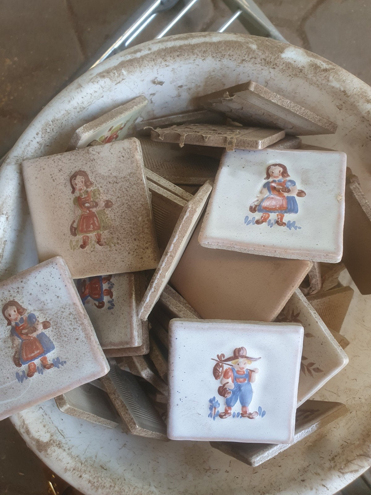 Vintage tegeltjes met Hollandse taferelen, Ophalen