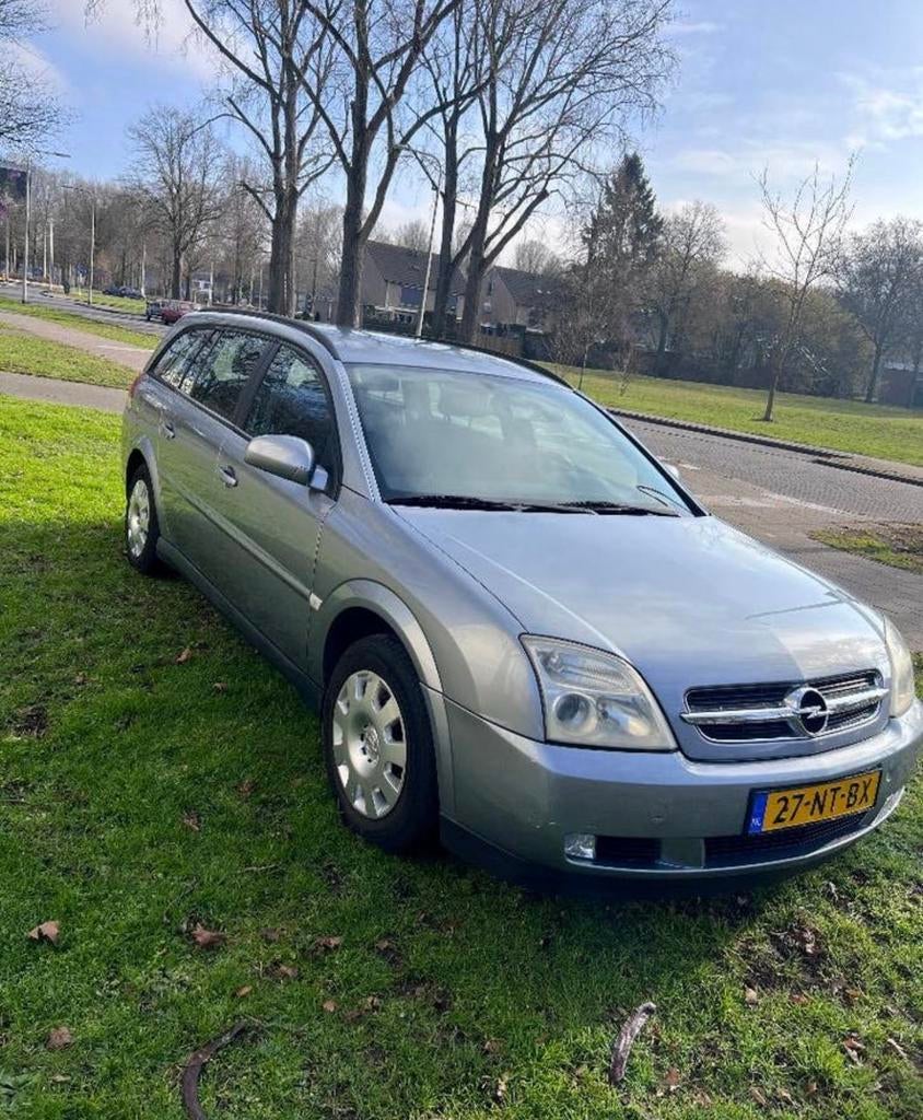 Opel Vectra 1.8 16V St.wgn. 2004 Grijs, Auto's, Opel, 1370 kg, 4 cilinders, 1796 cc, Origineel Nederlands