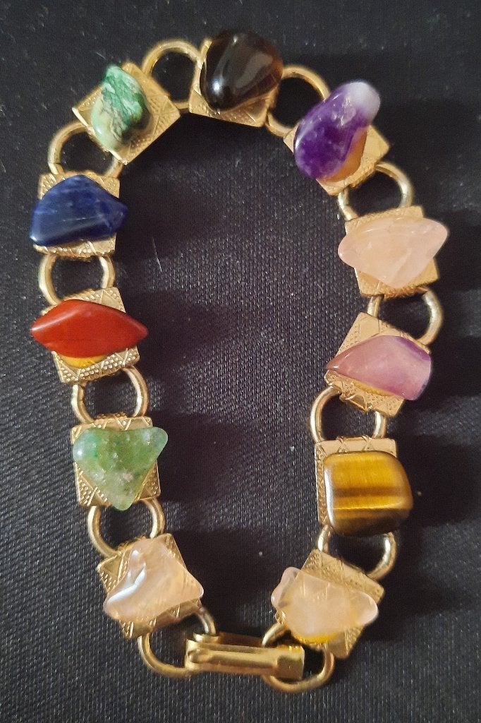 Armband met edelstenen en goudkleurige schakels, Overige materialen, Ophalen of Verzenden, Zo goed als nieuw, Met edelsteen