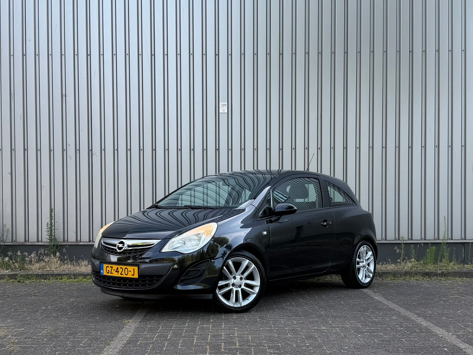 Opel Corsa 1.2 3D 2012 Zwart | Airco | Elektrisch pakket |, Auto's, Voorwielaandrijving, 40 €/maand, 4 cilinders, 1229 cc