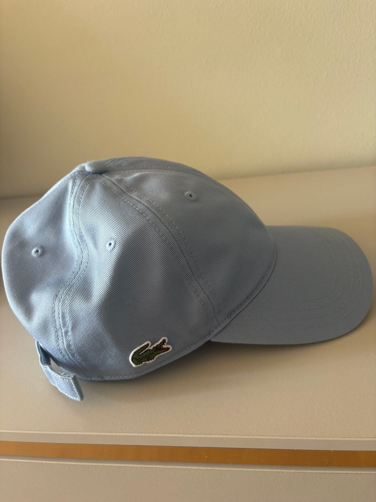 Lacoste pet. (Ongedragen), Ophalen of Verzenden, Zo goed als nieuw