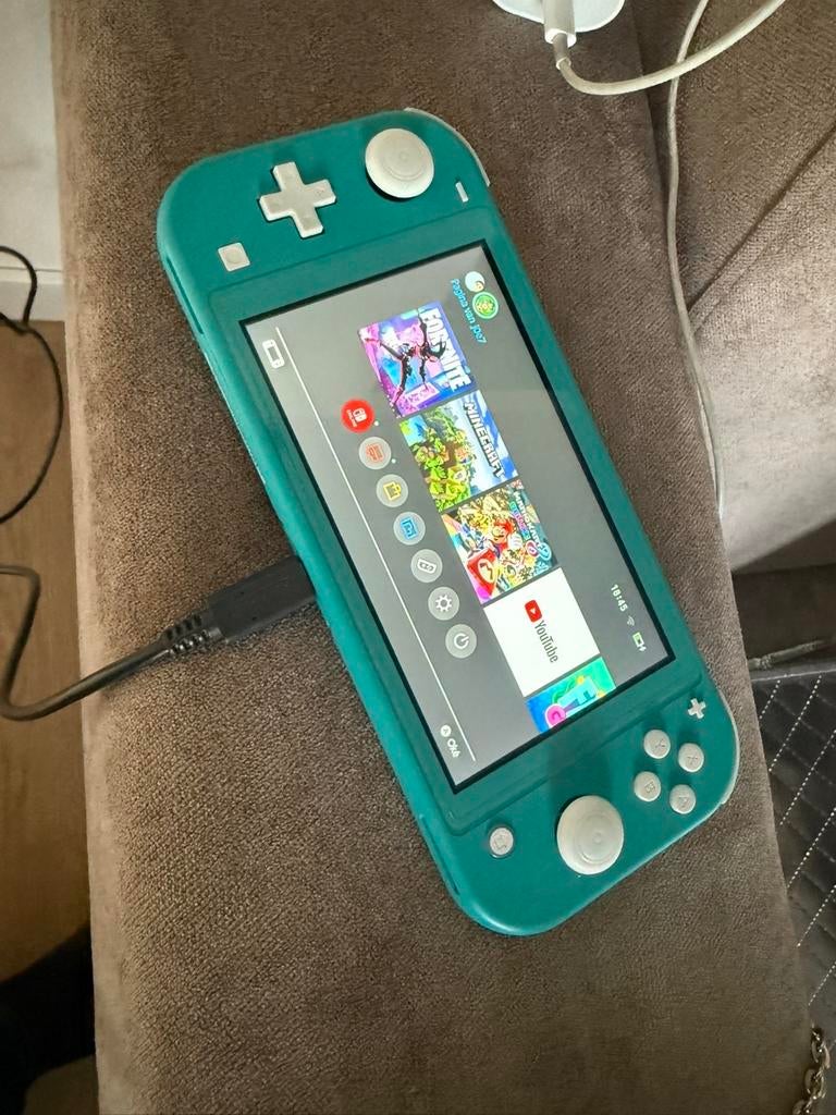 Nintendo Switch Lite blauw, Spelcomputers en Games, Spelcomputers | Nintendo Switch Lite, Ophalen, Turquoise, Gebruikt, Met beschermhoes of tas