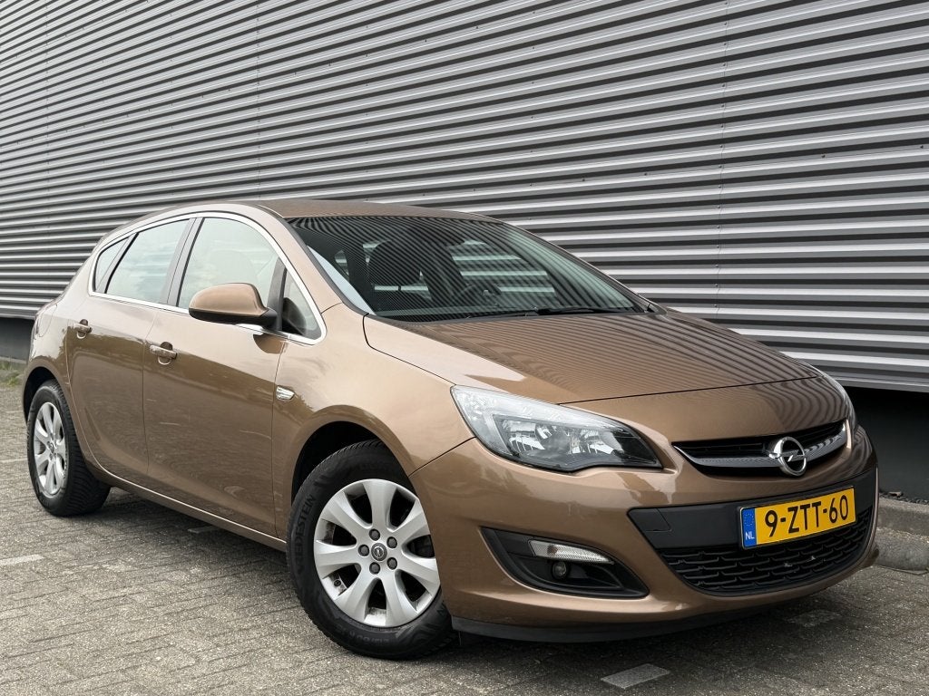 Opel Astra 1.4 120PK Turbo Sport+ / *NAP* / Airco / Cruise /, Auto's, Voorwielaandrijving, Stof, Gebruikt, 4 cilinders