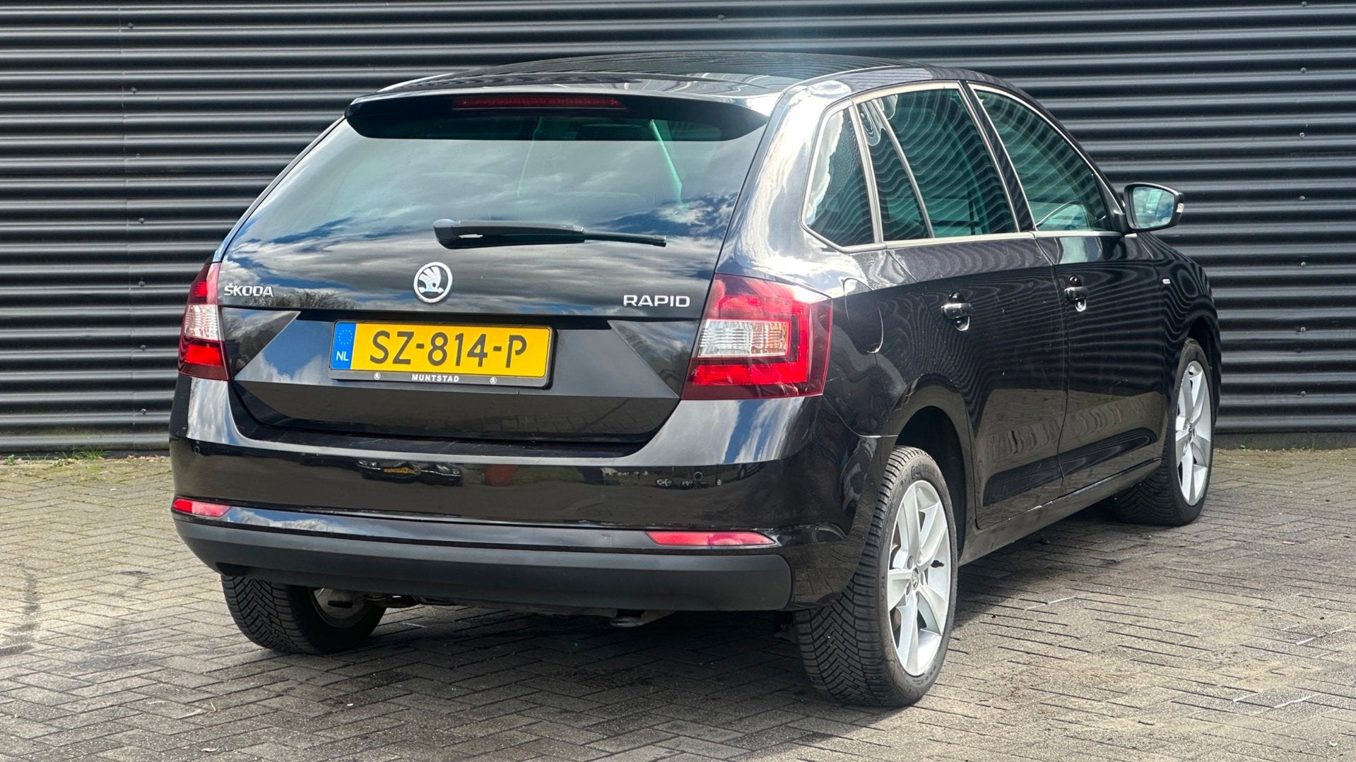 Skoda Rapid Spaceback 1.0 TSI 95pk DSG | Navi | Pano | Clima, Auto's, Stof, Gebruikt, 95 pk, Zwart