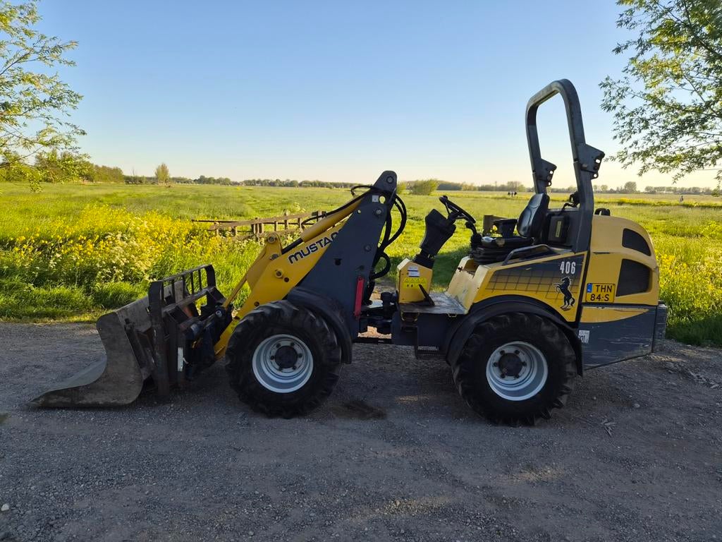 Mustang 406 shovel Gehl 440, Zakelijke goederen, Machines en Bouw | Kranen en Graafmachines, Ophalen, Wiellader of Shovel