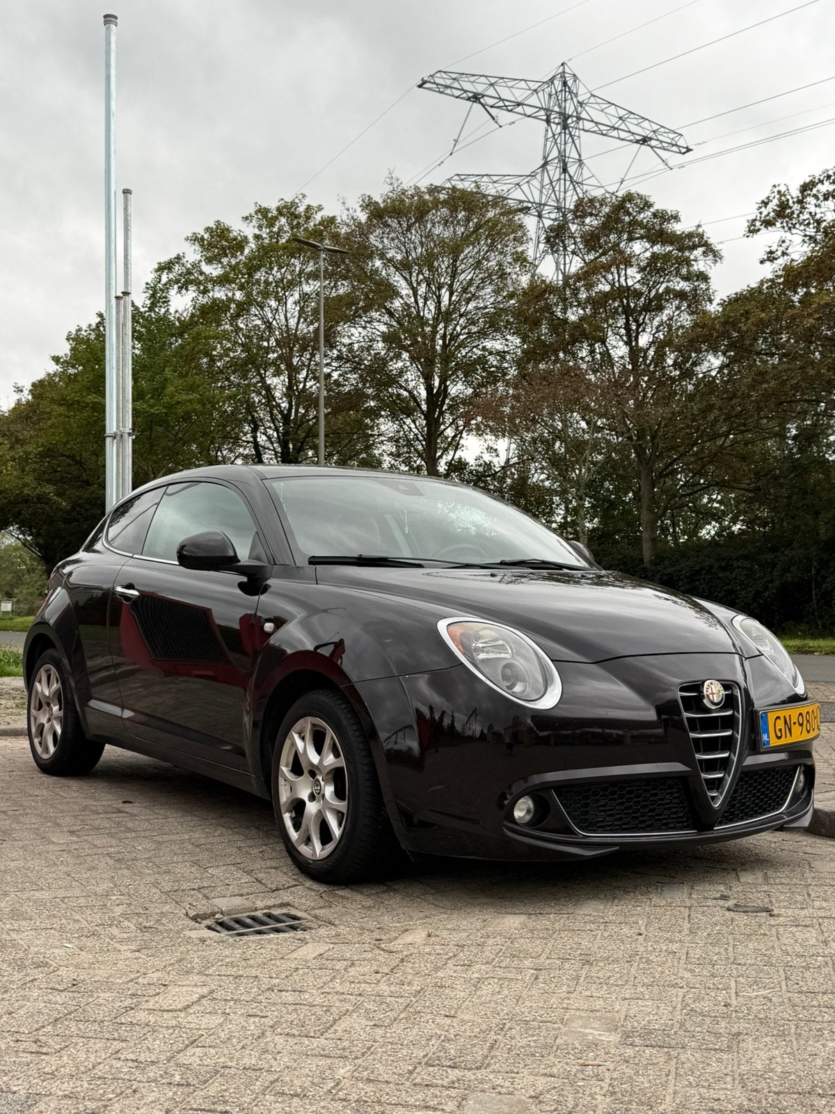 Alfa Romeo MiTo 0.9 Turbo Twinair 74KW/100PK 2015 Zwart, Auto's, Voorwielaandrijving, Euro 6, Bruin, 49 €/maand