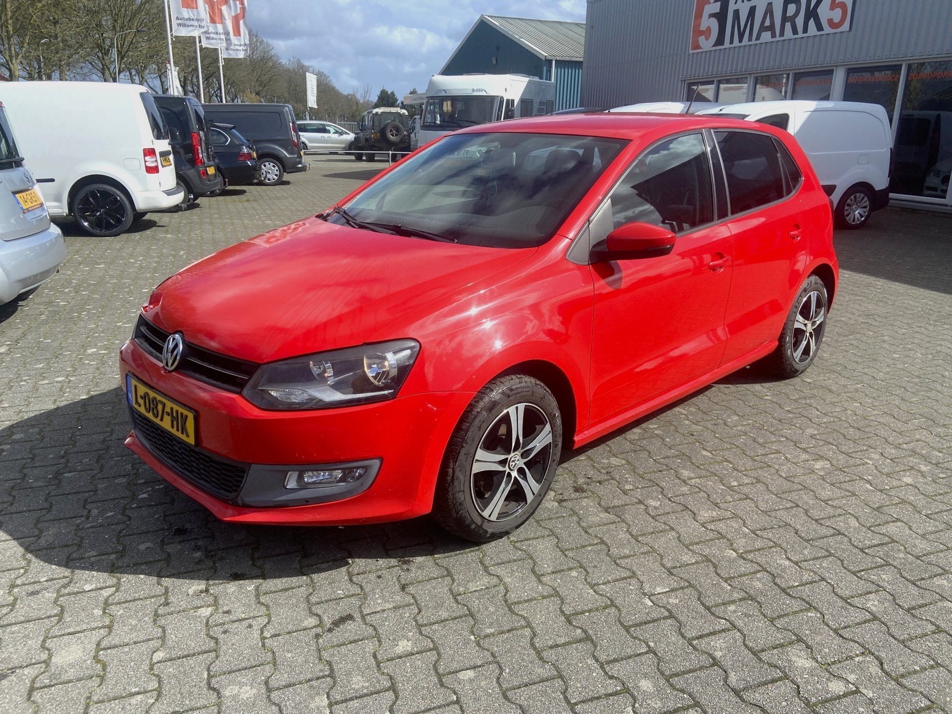 Volkswagen Polo 1.2 TSI Comfortline, Auto's, Voorwielaandrijving, Euro 5, Stof, Zwart