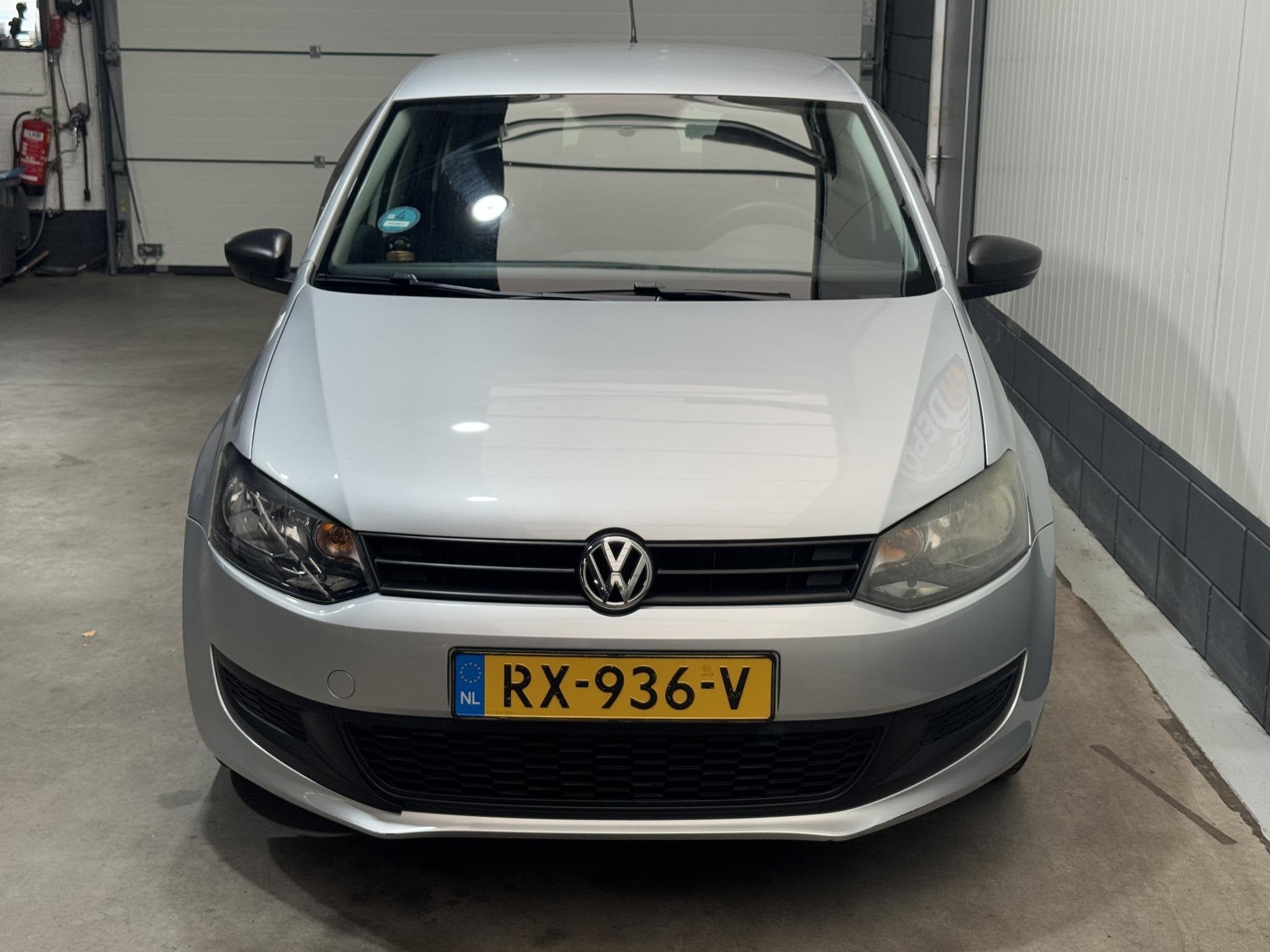 Volkswagen Polo 1.2-12V Comfortline, Auto's, Voorwielaandrijving, Euro 5, Zwart, 1198 cc