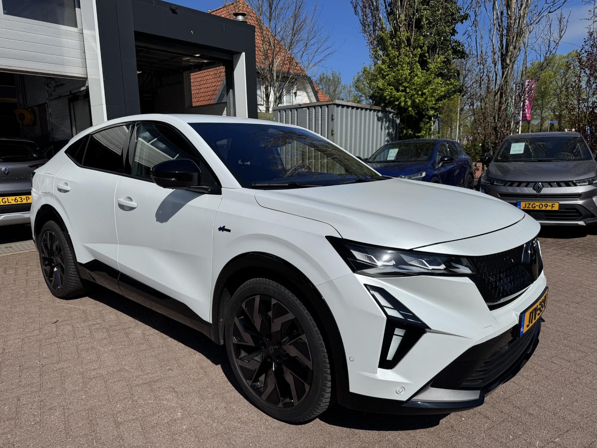 Renault Rafale 1.2 E-Tech 4x4 plug-in hybrid 300 esprit Alpi, Auto's, Renault, Automaat, Gebruikt, 1199 cc, Wit